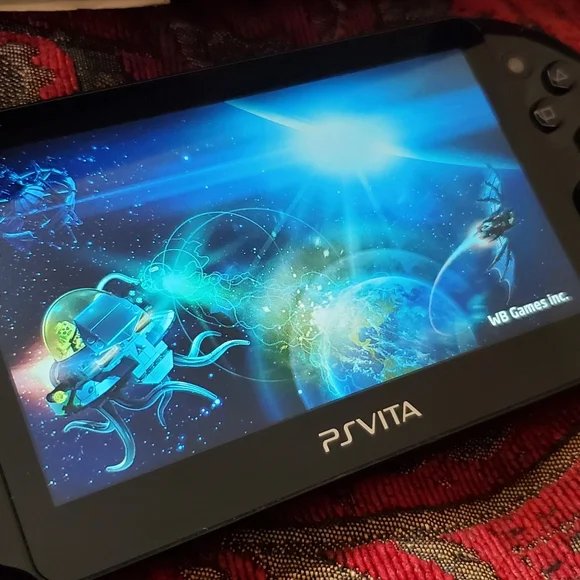 Playstation VITA Bundle W/Games, Charger, MEMORY Card... - Picture 5 of 9